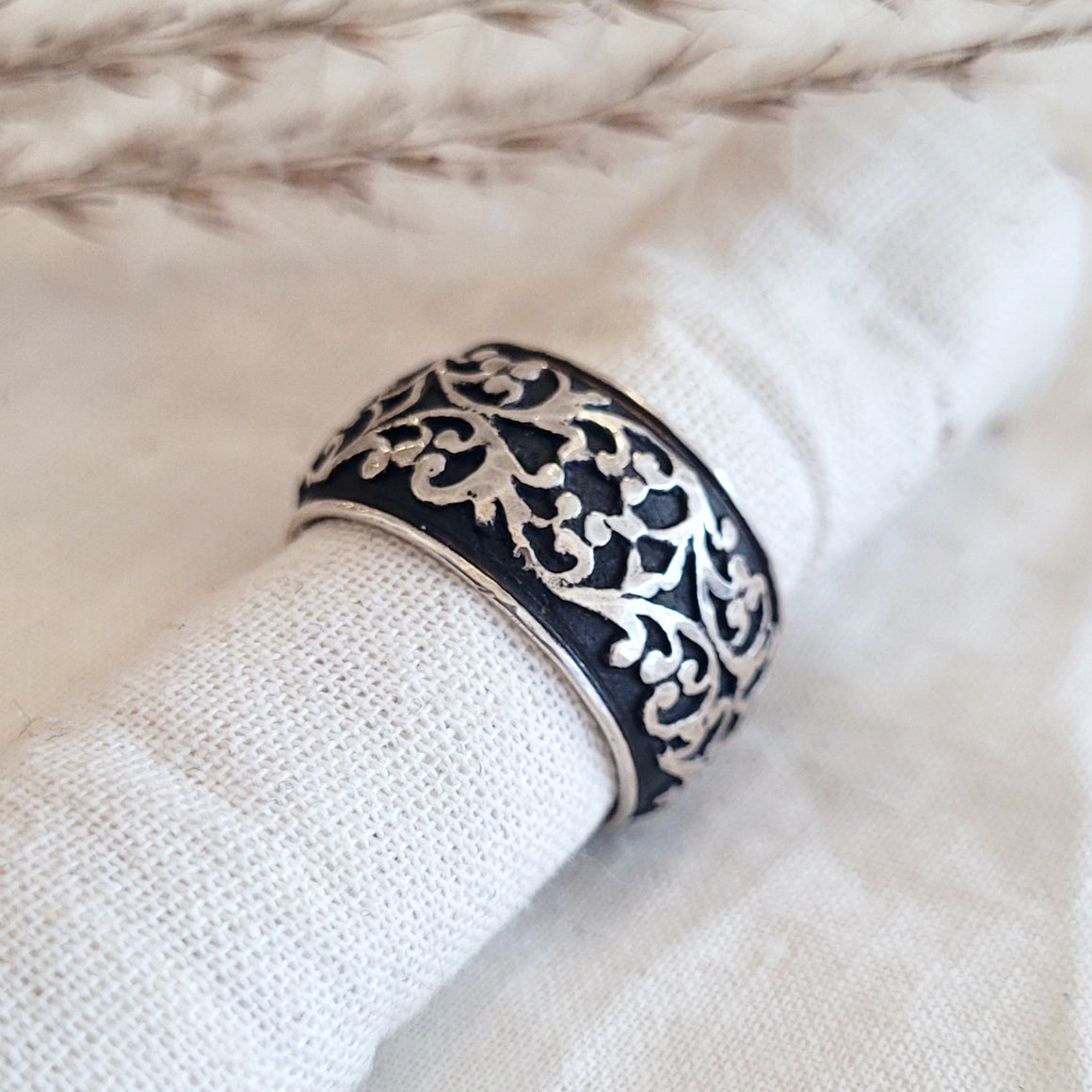 Sterling silver wide carved scroll band