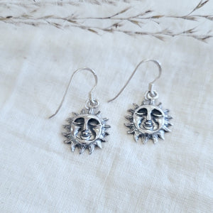 Sterling silver sun face drop earrings