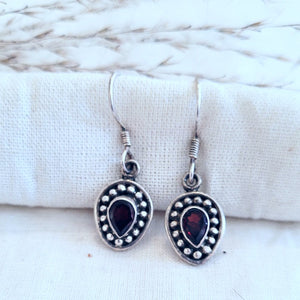 Sterling silver faceted garnet drop earrings with beaded border