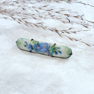 Antique brass hand painted porcelain floral pin, circa 1900