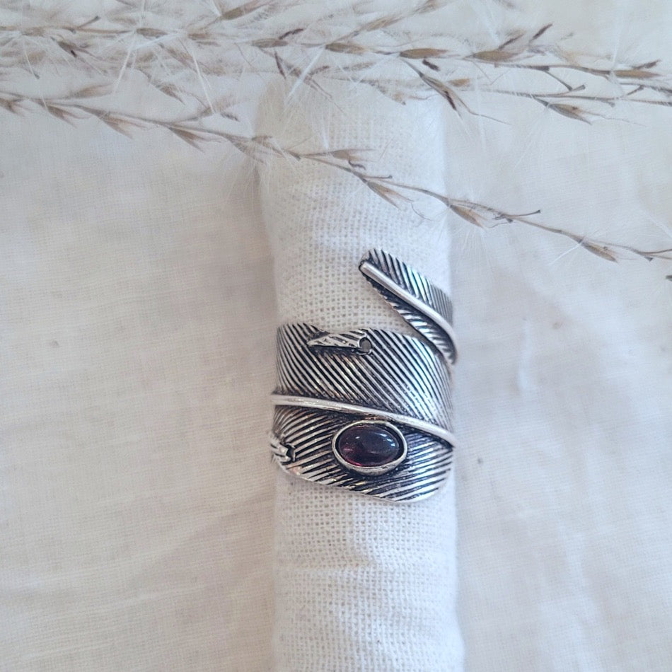 Sterling silver stylized garnet cabochon feather wrap ring