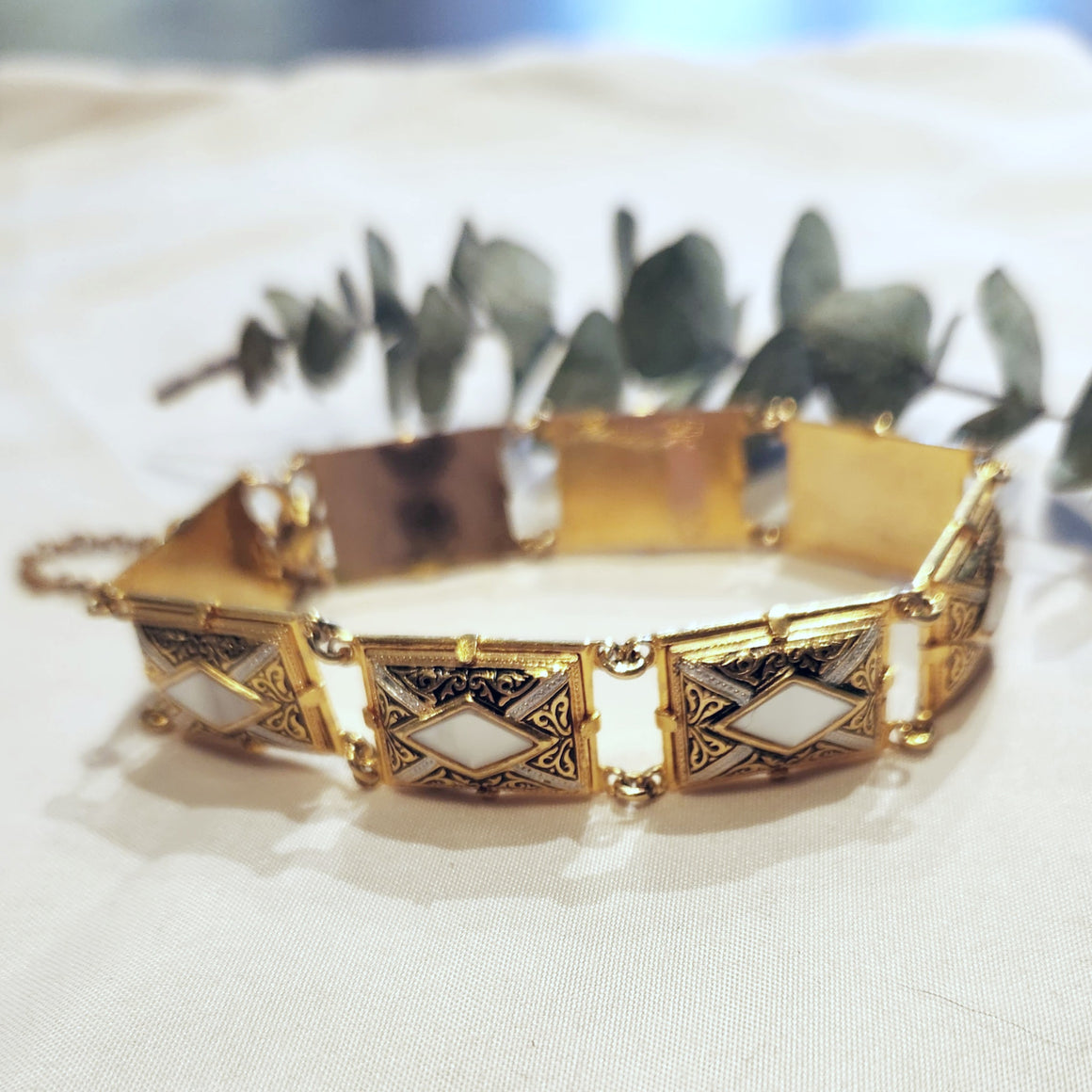Damascene gold plated link bracelet, circa 1950