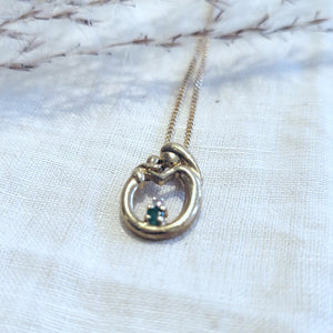10k yellow gold emerald and diamond mother and child pendant