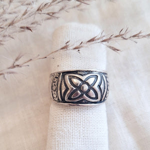 Sterling Silver solid floral design tapered band