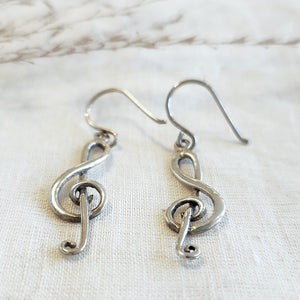 Sterling silver treble clef drop earrings