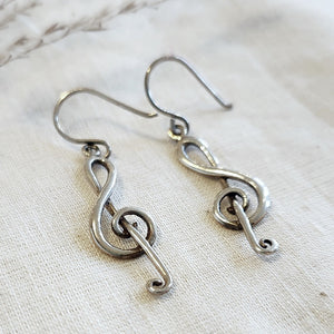 Sterling silver treble clef drop earrings