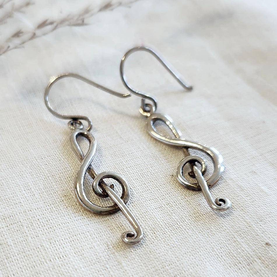 Sterling silver treble clef drop earrings