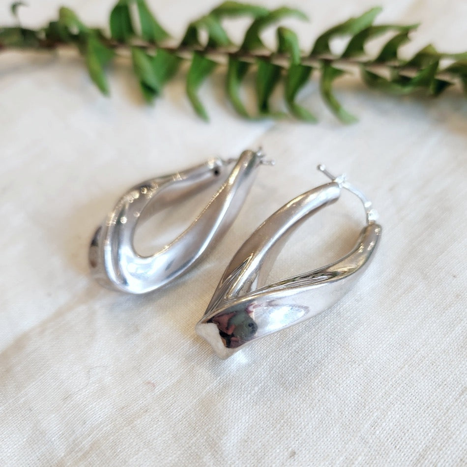 Sterling silver large twisted large oval drop hoop earrings