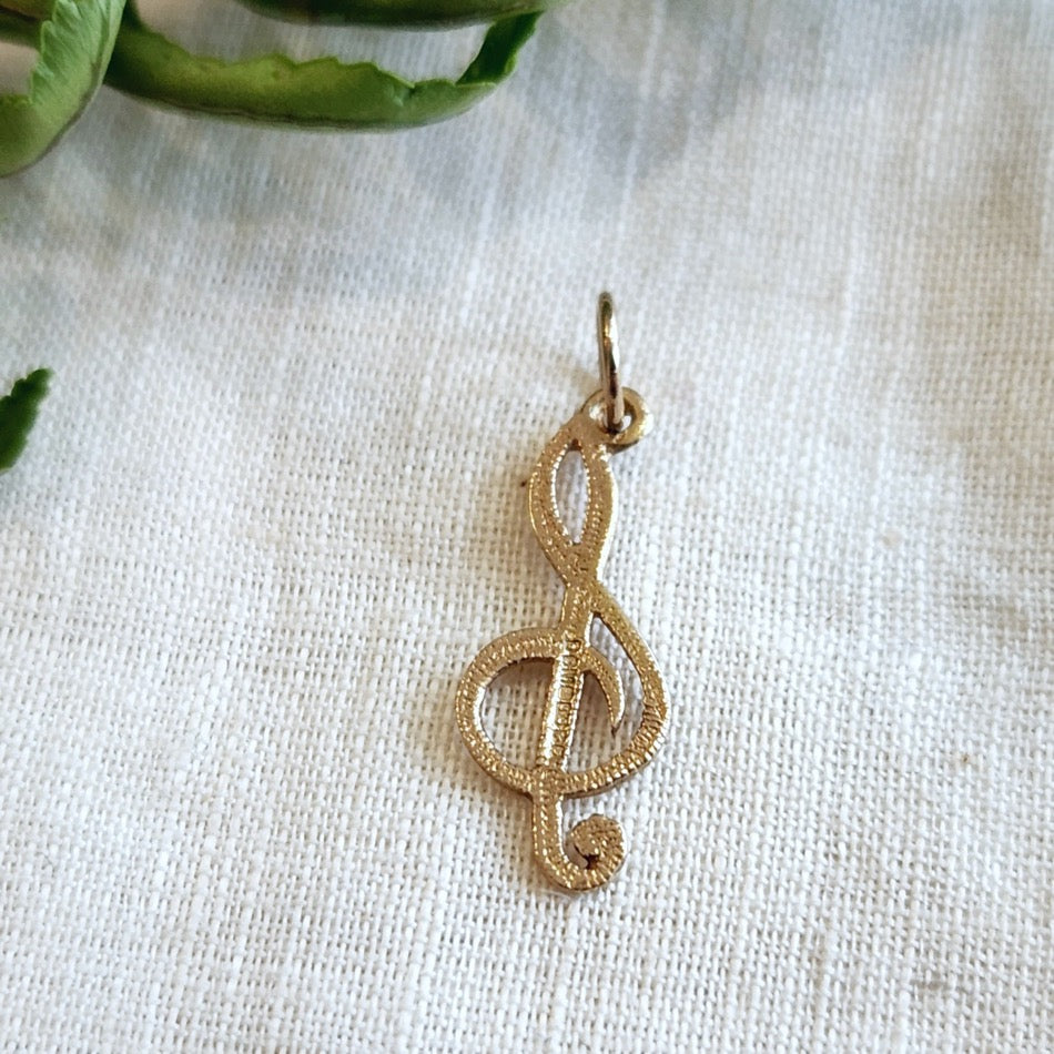 10k yellow gold treble clef charm