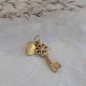 14k yellow gold key and heart pendant charm